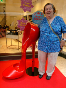 Maureen was intrigued by this giant shoe, reminding her of Mardi Gras and the Krew of Muses