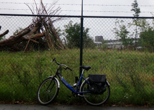 There is still a little open land in the city center as depicted by this rain-soaked bicycle. 