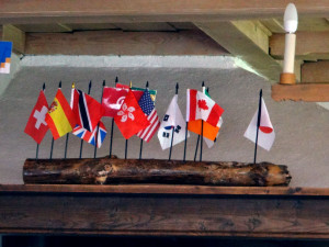 Little flags in a log mark the origins of guests visiting Our Chalet on any given day.