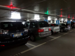 Parking garages are easy to find, clean, and automated. Red lights indicate the parking spot is taken, green lights tells you the spot is free. Check out is also automated with machines and instructions located on each level of the garages.