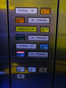 Parking garage elevator - easy to understand and almost always in English