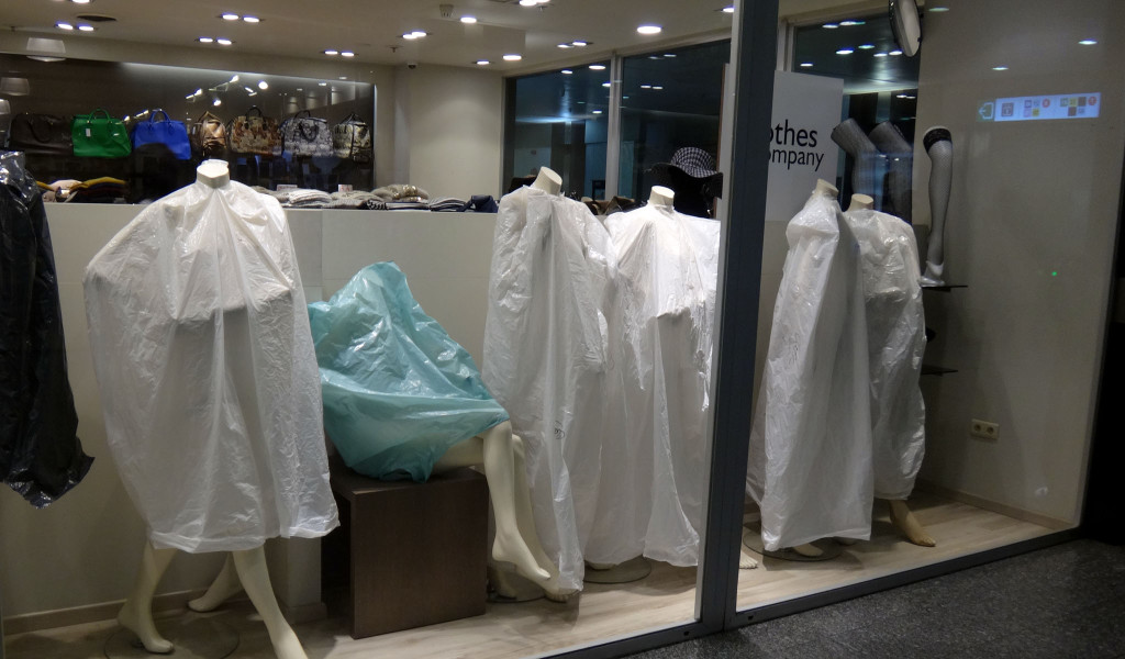 When merchandise goes on sale at the end of the season. some stores advertise by putting bags over all the mannequins.