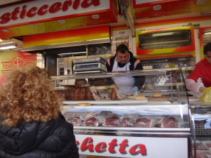 Porchetta wrapped in a rich spinach filling at the Marsciano Market.