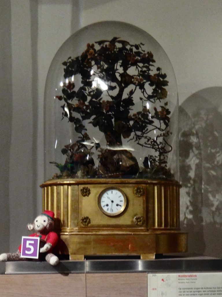 This music box/clock plays a sweet little tune as birds twirp in the trees.